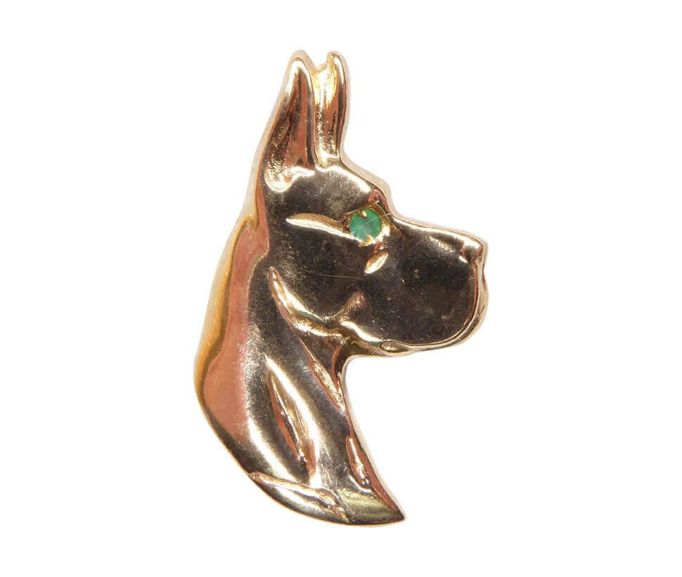 Afbeelding van Christian Gouden hond met smaragd