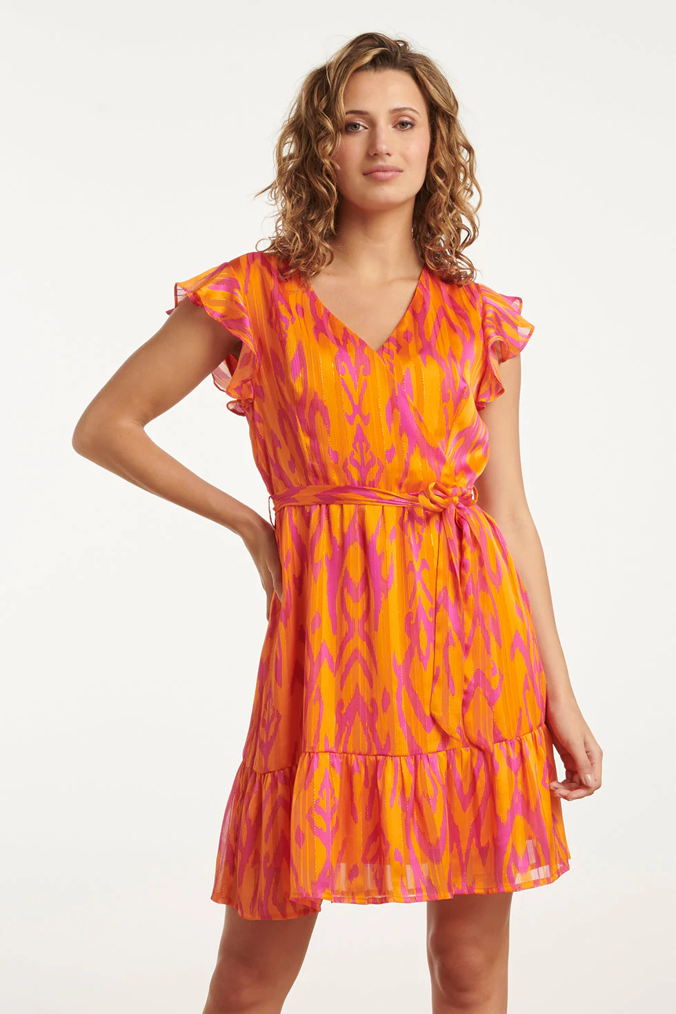 Smashed Lemon 25075 orange aztec print chiffon frilly jurk |
