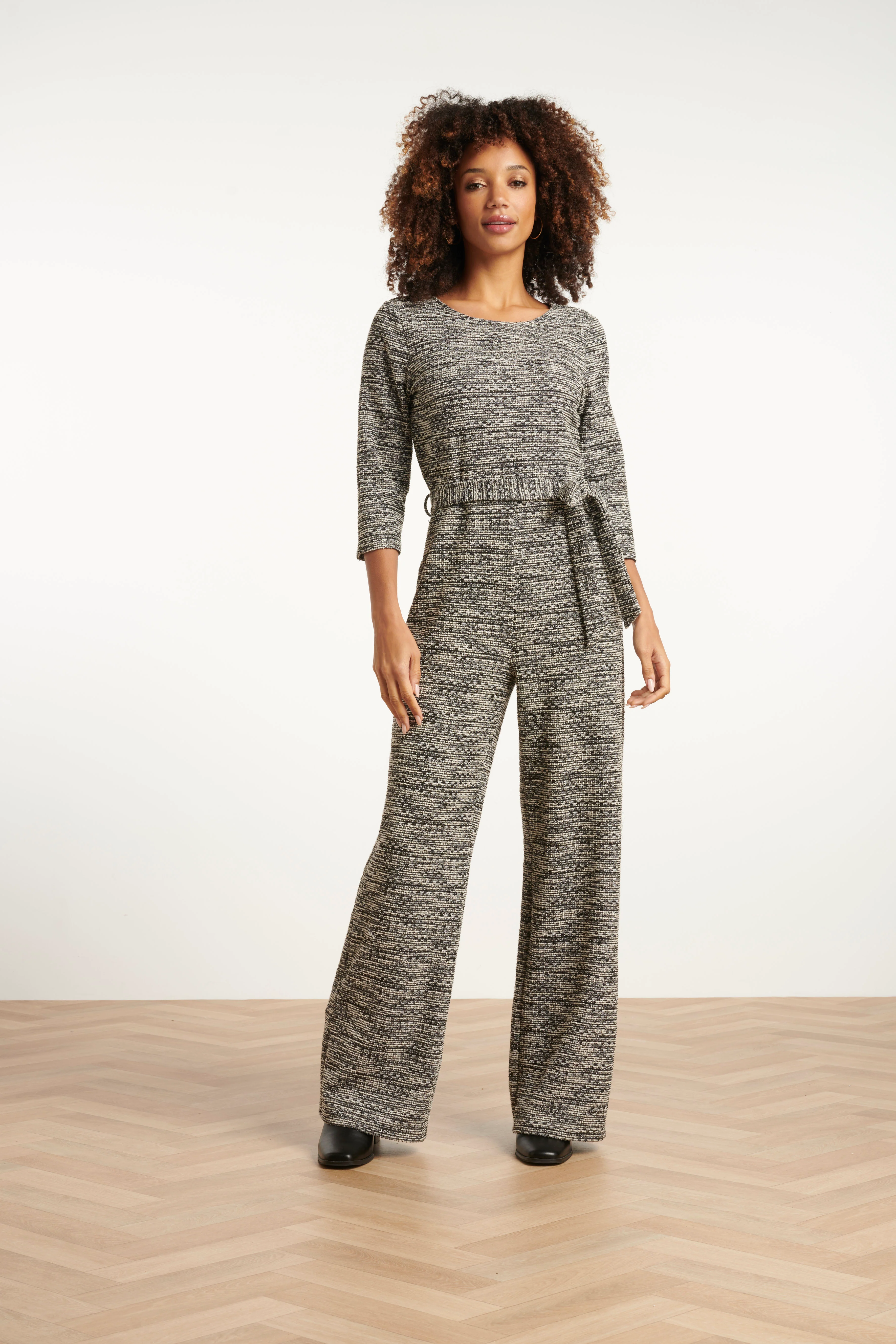Smashed Lemon Jumpsuit met wijde pijpen en tweedlook stof zwart en wit |