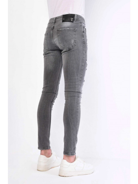 Local Fanatic Spijkerbroek verfspatten slim fit 1064 LF-DNM-1064 large Local Fanatic Spijkerbroek verfspatten slim fit 1064 LF-DNM-1064 large