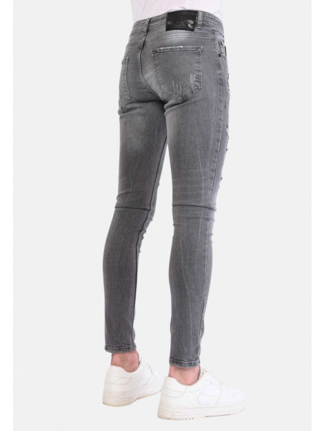 Local Fanatic Spijkerbroek verfspatten slim fit 1064 LF-DNM-1064 large Local Fanatic Spijkerbroek verfspatten slim fit 1064 LF-DNM-1064 large