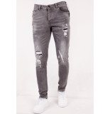 True Rise Damaged slim fit jeans met paint splatter dc