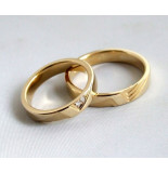 Christian Gouden trouwringen met 2 diamanten